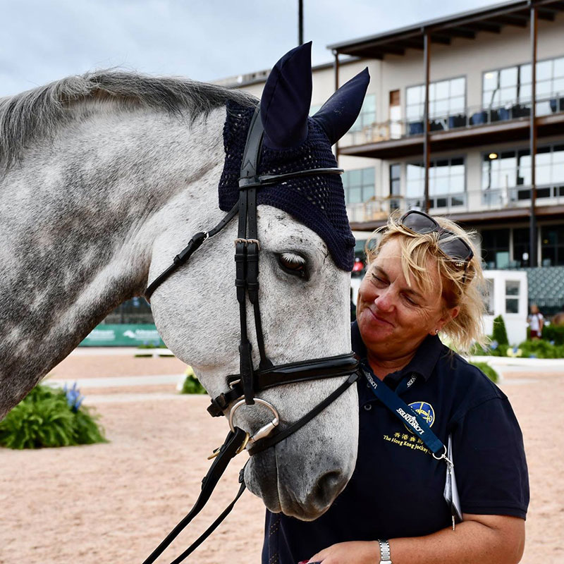 Corinne Bracken, show jumping performance manager for the Hong Kong equestrian team, works as a coordinator and mentor of showjumpers at international competitions.  (Photo provided by interviewee)